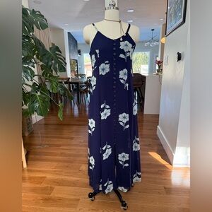 Fit and flair maxi dress. Rayon and cotton. Buttons down. Size M